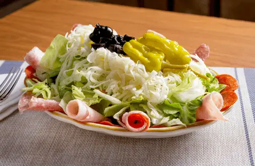 Antipasto salad is a delicious and easy side dish that can be made in just 15 minutes. This recipe includes a variety of Italian meats, cheeses, and vegetables, making it the perfect dish to serve as an appetizer or primary course