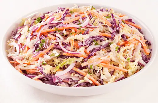 Coleslaw is another traditional side dish that pairs well with scotch eggs. The creamy dressing pairs nicely with the crispy breading on the egg