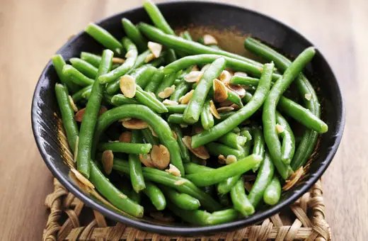 Green beans are a common accompaniment to chicken adobo. The beans are usually boiled or steamed until they are tender and then served alongside the chicken and rice. 