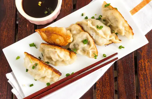 These pan-fried dumplings make a delicious appetizer or main course. Serve with soy sauce or chili sauce for dipping; best for serving with Chinese scallion pancakes.