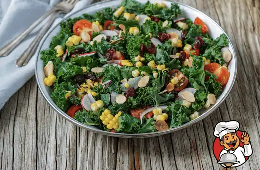 Kale salad is a nutrient-packed side that is surprisingly easy to make. Simply massage some kale with olive oil and lemon juice, then top with your favorite toppings (we like roasted almonds and dried cranberries). 