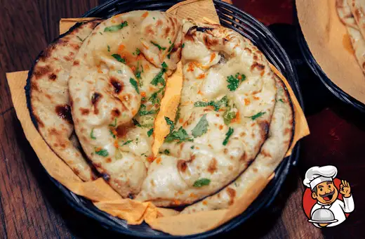 A type of leavened Indian flatbread, naan is typically cooked in a tandoor oven. It can be found in most grocery stores, however, if you don't have access to one. 
