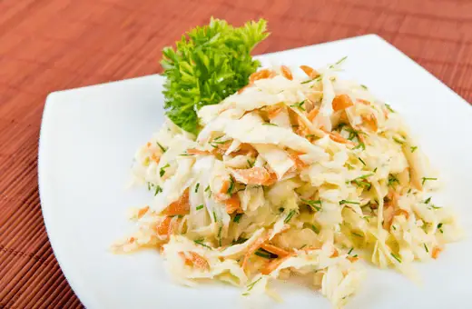 Any experienced cook knows coleslaw is the perfect dish for mojo pork. The acidity of the coleslaw helps balance out the rich, savory flavors of the pork, and the crunchy texture contrasts the tender meat. 