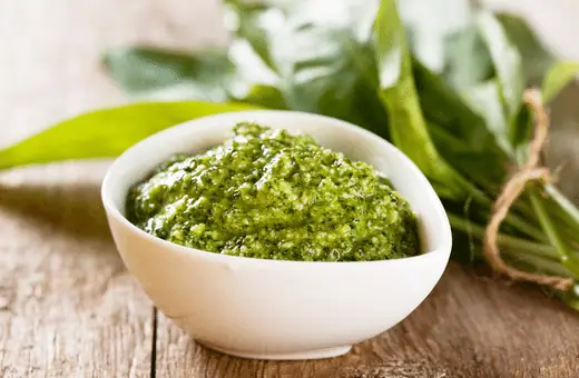 Pesto is a classic sauce for paninis. It is a traditional Italian sauce with basil, pine nuts, Parmesan cheese, garlic, and olive oil. 