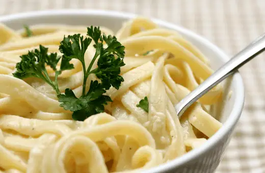 Fettuccine Alfredo is a classic Italian dish perfect for pairing with steak