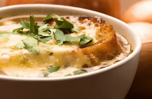Another favorite comfort food classic that pairs well with crispy, crusty bread is French onion soup gratinée.