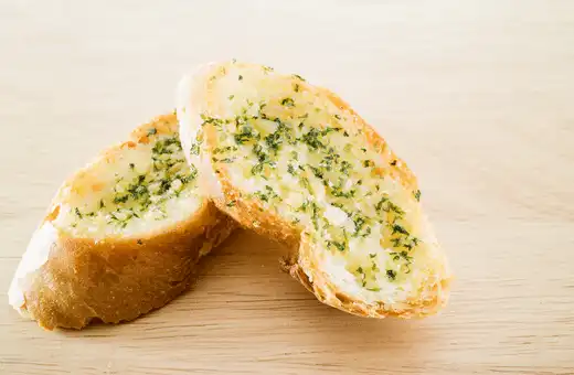 Garlic bread is always a hit at any dinner table, and it pairs perfectly with coconut shrimp.