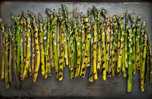 Grilled asparagus is another great way to get your veggies while enjoying some fried chicken tenders! 