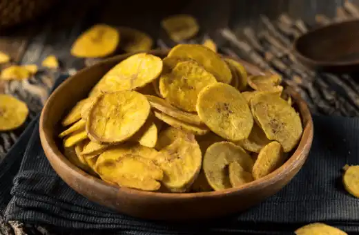 Plantain chips are a delicious and unique way to add a crunchy texture to your meal. They have a mild flavor that won't overpower the sweetness of the coconut shrimp, so plantain chips are the perfect pairing. 