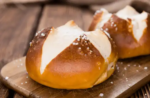 Soft pretzel rolls are perfect for wrapping up your brats and adding a unique crunchy texture to your meal.
