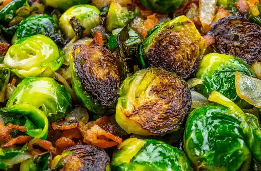 Roasted Brussels sprouts are a simple side dish for leftover pizza. They are easy to prepare and have a deep flavor.