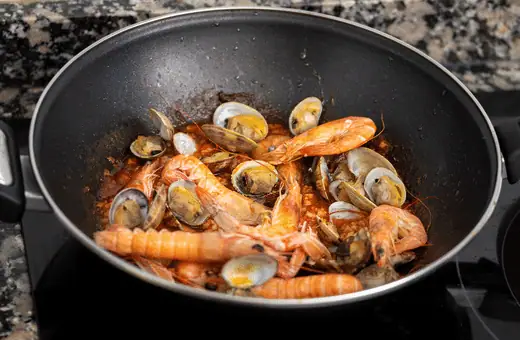 Sauteed seafood is an excellent side dish to serve with potato wedges. Succulent seafood like shrimp, scallops, and clams are cooked quickly in a pan with butter and garlic for the perfect combination of flavors. 