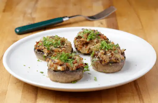 Bite-sized savory stuffed mushrooms are another great option for the most delicious pre-pizza snack ever! 