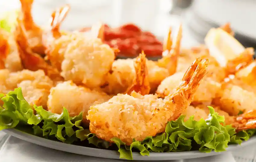 Coconut shrimp is a delicious, flavorful dish that can be served as an amazing appetizer or main course. As with any meal, it's crucial to choose a side dish that perfectly complies with the flavors of the coconut shrimp.