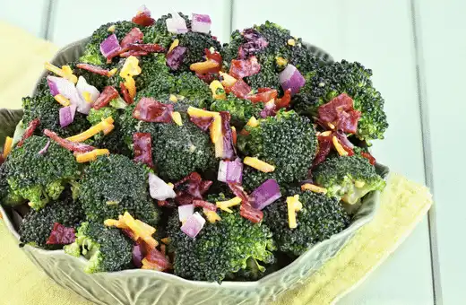 Broccoli salad is the perfect mix of sweet and savory flavors that pairs perfectly with cheesy potatoes.