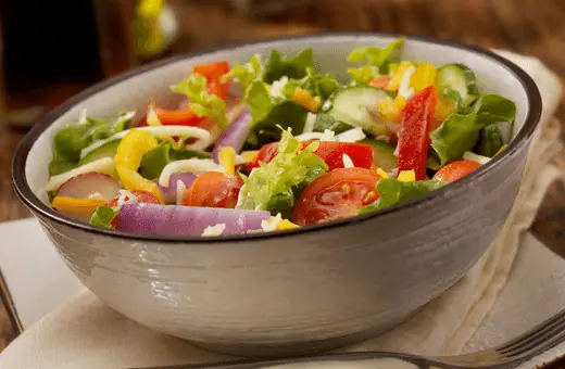 garden salad is always a great accompaniment to a hearty meal like chicken and rice casserole