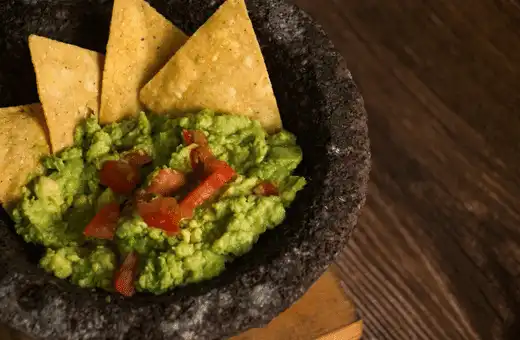 No nacho platter is complete without freshly made guacamole!