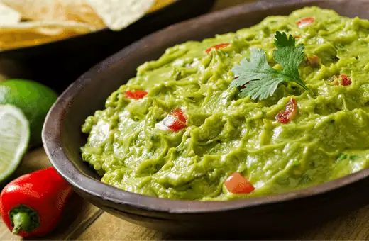guacamole is a good side to serve with pinwheels