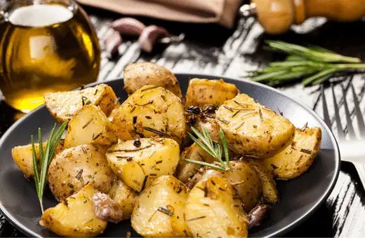 roasted potatoes are a classic accompaniment to tuna cakes