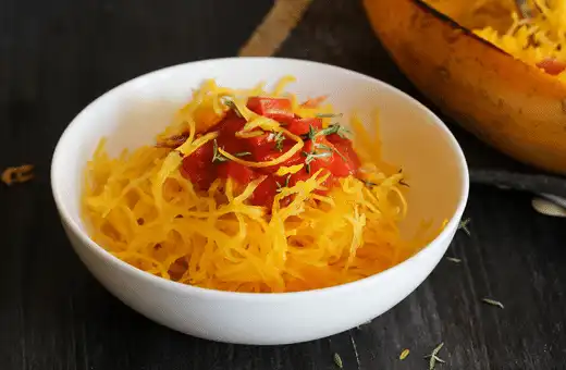 Spaghetti squash is low in carbs but high in fiber, making it an ideal choice if you're looking for something healthier than traditional sides like mashed potatoes or macaroni & cheese but still taste enough with onion rings