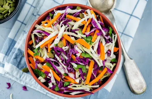 you can try spicy slaw to serve with corn dogs