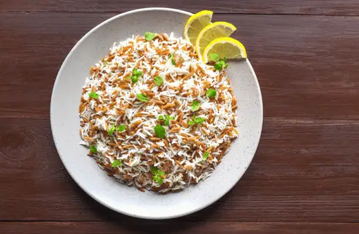 turkish rice pilaf with orzo make for a deliciously simple way to enjoy some seafood like boom boom shrimp