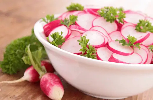 Spicy radishes, peppery arugula, and a punchy lemon-dijon dressing make this a great refreshing side to a charcuterie plate.
