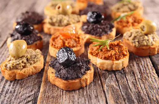olive tapenade crostini is a good pair to serve with olives