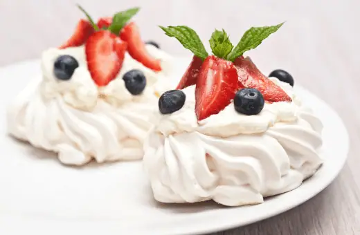 A pavlova is a great way to take advantage of seasonal fruits; top it with berries or stone fruit for a light yet indulgent dessert. 