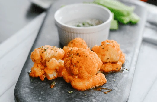 buffalo cauliflower bites are great to serve with wraps