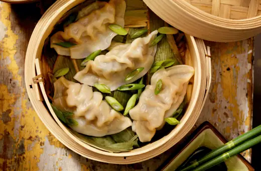  steamed dumplings are another popular appetizer to serve with crab rangoon