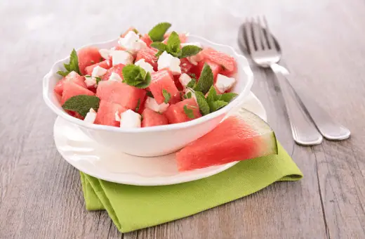 Juicy watermelon cubes are combined with creamy feta cheese, tangy red onions, fresh basil leaves, and a splash of balsamic vinegar for an irresistible mix that will keep everyone coming back bite after bite!