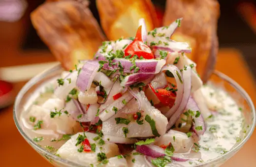 Ceviche is a classic Latin American dish with raw fish marinated in lemony citrus juices. It is an ideal accompaniment to a mojito. The flavors of the two pair together perfectly.