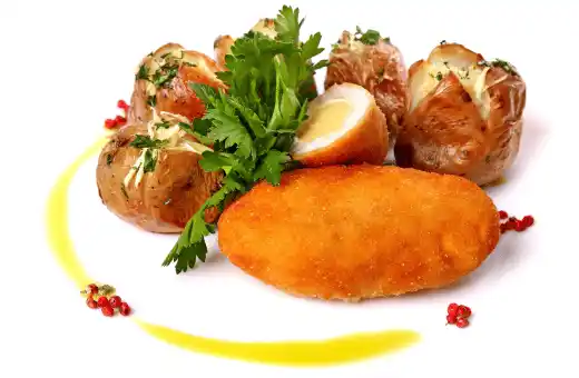 chicken kiev and potatoes